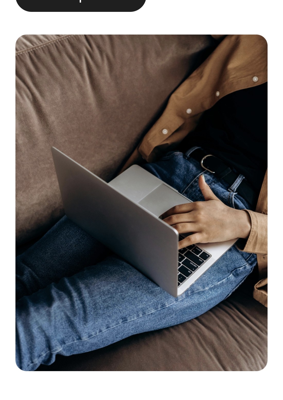 Person browsing support answers on a laptop